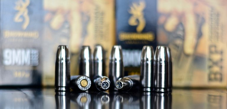 Browning pistol bullets displayed on a table